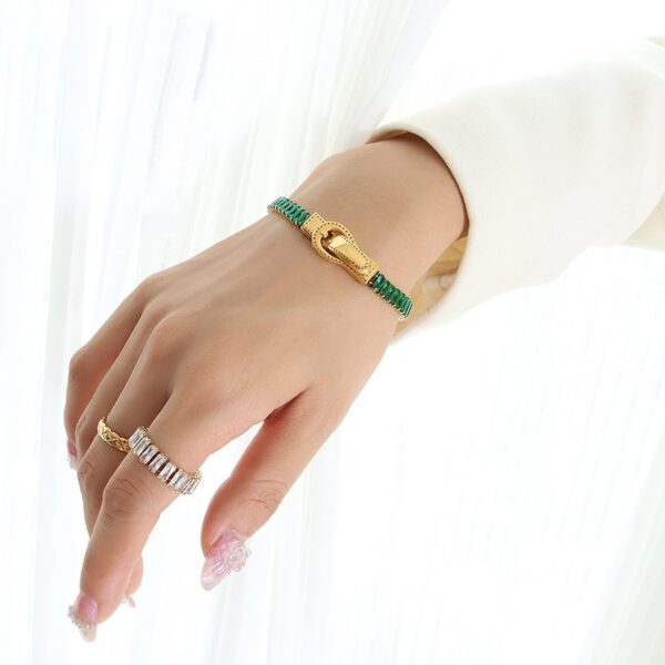 oly-a25cdad9d8f049af44ec109a0e08e0c8 Wholesale light luxury seven kinds of color zircon double-sided iron buckle design suction bracelet titanium steel gold-plated four-corner buckle jewelry