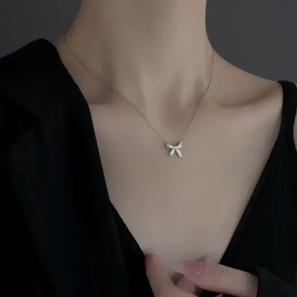 Wholesale Women’s Bow Tie Pendant Necklace With Inlay Artificial Rhinestones, 18K Real Gold Plated Copper, Water Plating On Cable Chain