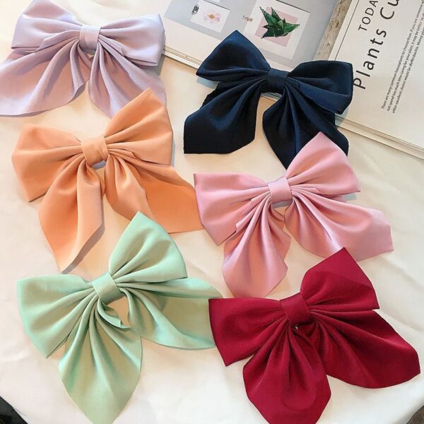 oly-a29a85b8c76b95b4fecb377502e87256 Wholesale pure color temperament bow hairpin college style Japanese JK ponytail clip duckbill clip girl hair accessories