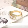 Wholesale Copper Plating 18K Color Retaining Glossy Zircon Imitation Pearl Open Ring