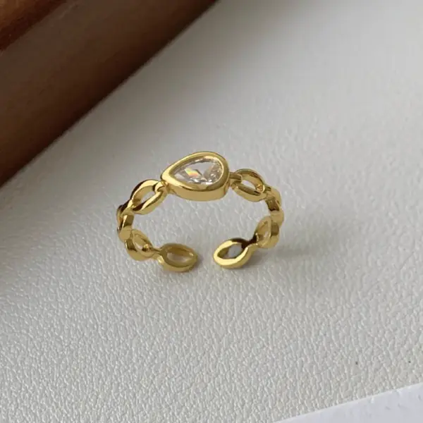Wholesale Women’s Electroplated Water Droplets Ring In Golden Plated Brass With Zircon Inlay