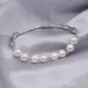 Wholesale Women’s Tree Pattern Copper Bangle Bracelet With Electroplated Gold Plating And Imitation Pearl Inlay In Simple Style