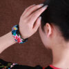 oly-a3b97b0d9f4d88c537335c6b24333126 Wholesale Original handmade retro artistic ethnic style embroidered bracelet female wide version elegant Miao silver cotton and linen all-match bracelet accessories