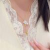 Wholesale Copper vintage four-leaf clover white shell tassel necklace, five-flower bracelet, earrings