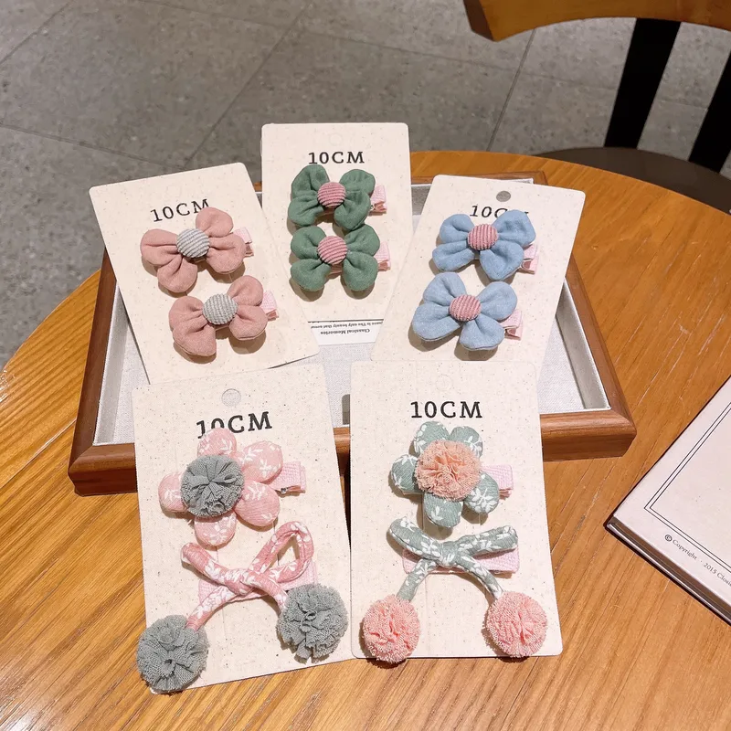 Wholesale Handmade Cotton Butterfly Knot Hair Clips Children's Edged Pure Color Flower Patterned Hair Accessories For Girls All Seasons