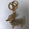oly-a653bdd8d886fc2124a95b71b18db5f9 Wholesale puppy keychain cute pet explosion keychain