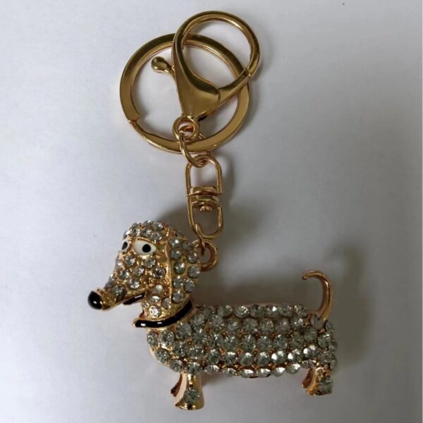 oly-a653bdd8d886fc2124a95b71b18db5f9 Wholesale puppy keychain cute pet explosion keychain