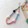 oly-a6d39cd70b18ae2a7d1e5fcdfc161ed7 Wholesale cute girl cream candy rabbit color acrylic multi-purpose anti-lost mobile phone chain
