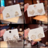 Wholesale Copper and silver needle Chanel-style stud earrings with diamonds, pearls, and zircon stones