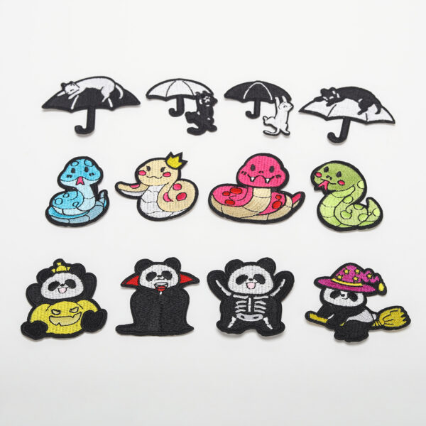 oly-a83863f8c7857f05a06876540bfe09ea Wholesale Elegant Embroidery Product Computer Embroidery Sticker Small Snake Cloth Sticker Original Black Cat Patch Sticker Magic Panda Bag Decorative Decal