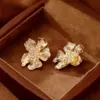 Wholesale Retro Floral Metal Zirconia Stud Earrings Women Simple Cold Style New Gold Color Ear Jewelry Bohemian Pattern Copper Material