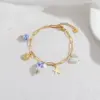 Wholesale Ceramic Blue And White Porcelain Bracelet Titanium Steel Shell Pendant 18K Gold Bracelet