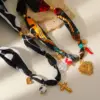 Wholesale Elegant Luxurious Lady Cross Heart Shape Ghost PVD Coated 304 Stainless Steel Imitation Pearl Ceramics Silk Scarf Cord Stretch Adjustable Pendant Necklaces Wholesale