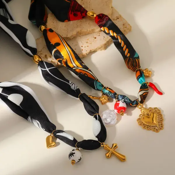 Wholesale Elegant Luxurious Lady Cross Heart Shape Ghost PVD Coated 304 Stainless Steel Imitation Pearl Ceramics Silk Scarf Cord Stretch Adjustable Pendant Necklaces Wholesale