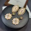 Wholesale French Style Oil Painting Drip Earrings Beige Sweet Niche Design Versatile Elegant Shell Embedded Copper Earrings For Women
