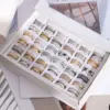 Wholesale Unisex Geometric Rings In Titanium Steel With PVD Coated Gold Plating And Rhinestone Inlay Featuring Cutting Craft