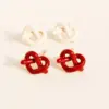 Wholesale 1 Pair Elegant Simple Style Commute Geometric Heart Shape Lines Enamel Inlay Brass Enamel 24K Gold Plated Ear Studs