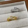 Wholesale Women’s Electroplated Water Droplets Ring In Golden Plated Brass With Zircon Inlay