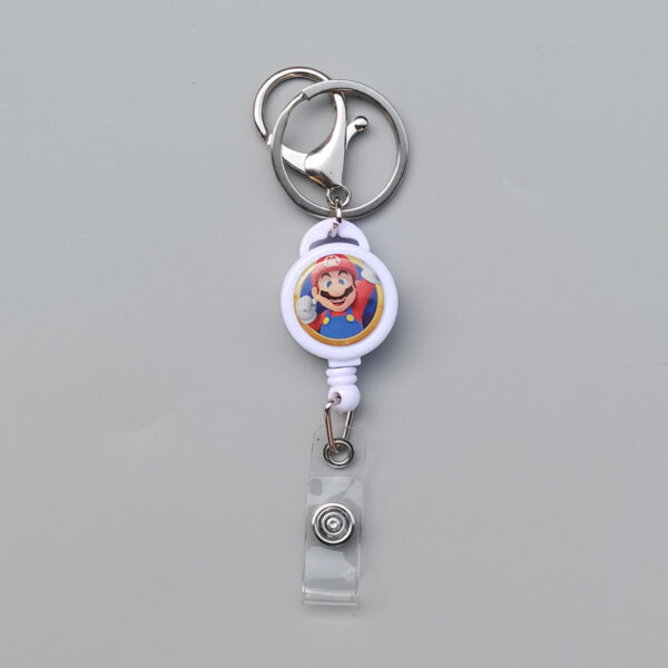 oly-ac6ce7e1444fcd9071c58ede46e66c37 Wholesale in stock cartoon glue drop retractable easy pull buckle manufacturers ID buckle round easy pull badge metal buckle