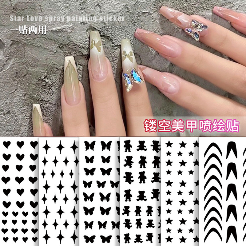 Wholesale Net red hollow stickers new upgrade French flower love butterfly spray gun spray template nail nail stickers
