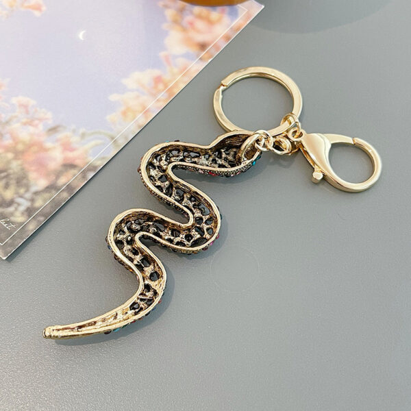 oly-ad06de93163f4094e60577f1753bdd2e Wholesale Retro twelve Zodiac diamond snake car pendant creative colorful snake keychain bag ornaments small gift