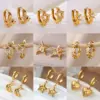 Wholesale Three-dimensional Sun Stud Earrings For Women In 304 Stainless Steel With 18K Gold PVD Coating And Zircon Inlay
