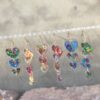 oly-ae8ff7837c92467358901dc9559d0832 Wholesale acrylic sequins asymmetric heart-shaped triple love personality simple retro earrings earrings color