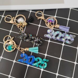 Wholesale Resin flash 2025 years digital creative accessories popular love hanging sequins mixed color keychain