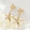 Wholesale Starfish Stud Earrings For Women In Copper With Electroplated Gold Plating And Zircon Inlay