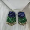 oly-b0fd34748c9d4e717a411e22b3df0d35 Wholesale Christmas Series Tassel Trapezoidal Shaved Glossy Leather Earrings Faux Leather Jewelry Accessories