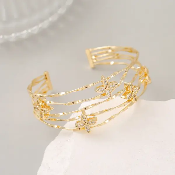 Wholesale Snake Pattern Bangle In Copper With 14K Real Gold Electroplated Finish Featuring Zircon Inlay In Gold