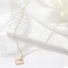 Wholesale Asymmetrical Shell Necklace For Women Featuring Copper Pendant With Electroplated Gold Plating