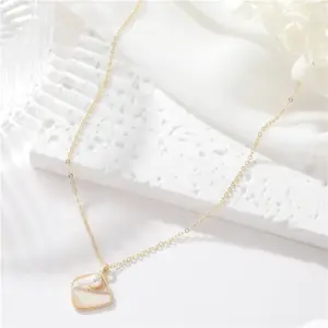 Wholesale Asymmetrical Shell Necklace For Women Featuring Copper Pendant With Electroplated Gold Plating