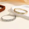 Wholesale Sparkly Waterproof Non Tarnish Bangle For Women In Copper With Real Gold Plated UV Plating And Zircon Inlay