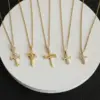 Wholesale 304 Stainless Steel Cross Electroplated Zircon Gold Plated Glam Modern Style Shiny Plating Inlay Gold Necklace
