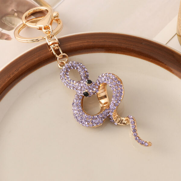 oly-b5a7f5f3b370fe4f1785363819bd827f Wholesale Zodiac series metal diamond animal snake key chain pendant exquisite bag ornaments small gifts