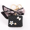 Wholesale Reduced Silk Scarf Bluetooth Headset Bag Leather Chanel Coin Purse Mini Keychain Small Bag Pendant