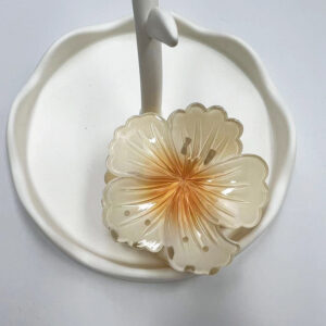 Orange heart on white background