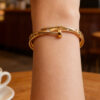 oly-b904de6e5cc7d7adb1eac92a21fbe665 Wholesale Stainless steel jewelry, colorfast, gold-plated nails, titanium steel bracelet