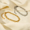 oly-b975db398e8727502356ca5fec2876aa Wholesale Oval Chain Cross Buckle Bracelet 18K Gold-plated Stainless Steel Fashion Women's Fashion Bracelet Hand
