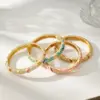 Wholesale Electroplated Flowers Bangle For Women In 304 Stainless Steel With 18K Real Gold Water Plating And Rhinestone Inlay