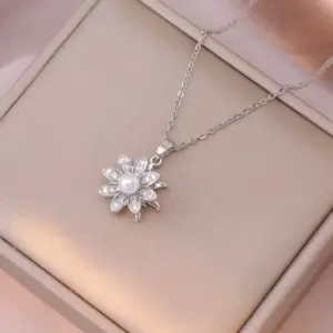 X0613 Steel Flower Rotating Necklace