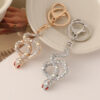 oly-bb119c7125d3bea8f10fb2ec23065b94 Wholesale Zodiac snake car keychain diamond exquisite bag pendant this life year snake series small gift