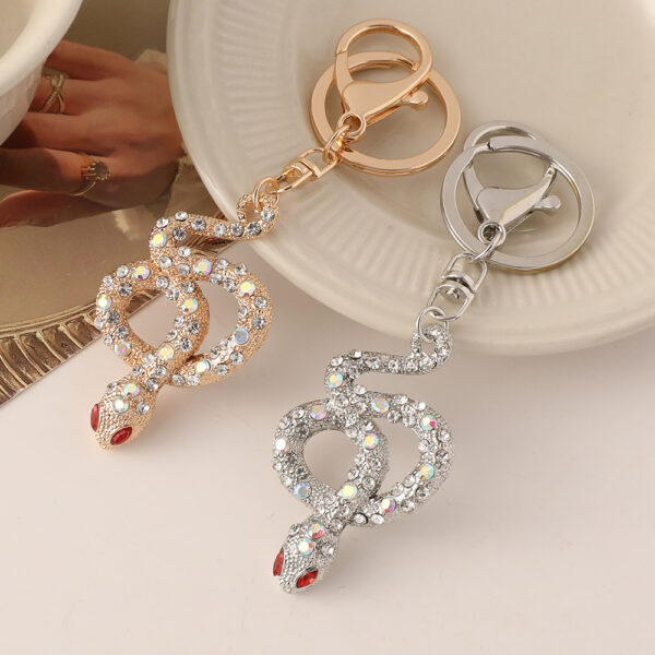 oly-bb119c7125d3bea8f10fb2ec23065b94 Wholesale Zodiac snake car keychain diamond exquisite bag pendant this life year snake series small gift