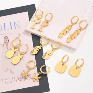 Wholesale Best Seller In 304 Stainless Steel Water Plating Furnace Vacuum Plating Light Gold Snowflake Cat Heart Key Feather Pineapple Small Size Hollow Face Earrings Earrings