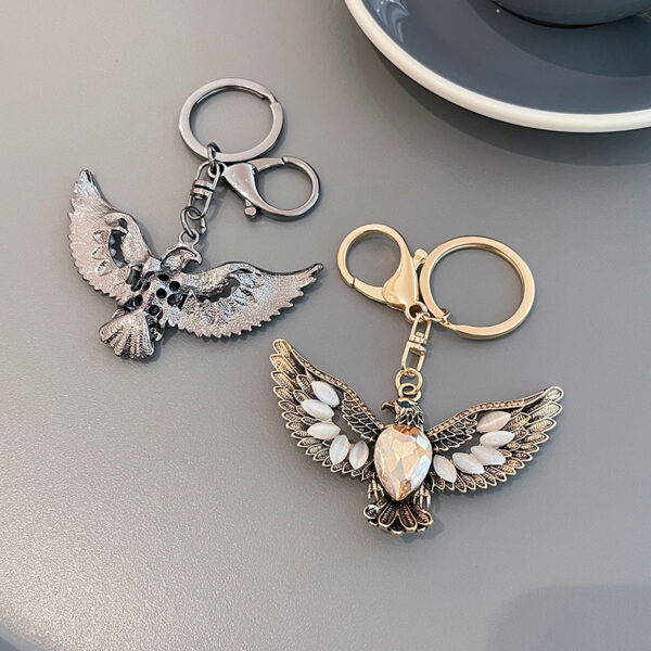 oly-bb86b24d32ca5c469ce33ce98abd15e5 Wholesale creative Opal eagle wing retro key chain car key chain accessories decoration key pendant