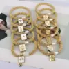 oly-bc0f0cfd646012e6ce88f6b26bd561b5 Wholesale Elegant Vintage Style Luxurious Cross Star Heart Shape Copper 18k Gold Plated Zircon Bracelets In Bulk