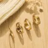 Wholesale Vacuum Electroplating (In Furnace) 18K Gold Plated 304 Stainless Steel Rose Flower Rope Knot Love Heart Zircon Metal Wind Ring