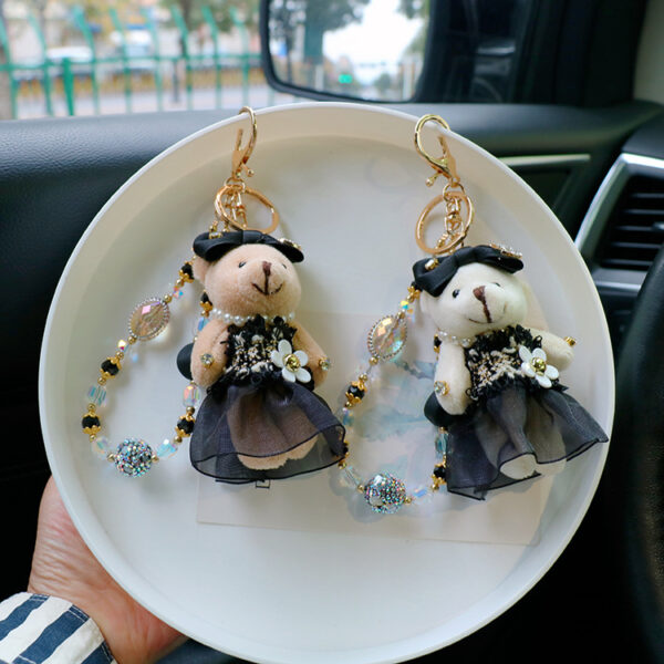 oly-be3b2ff341d57097c95a701a8340d8f5 Wholesale Personalized style lace skirt bear car keychain exquisite crystal bracelet bag pendant creative key chain