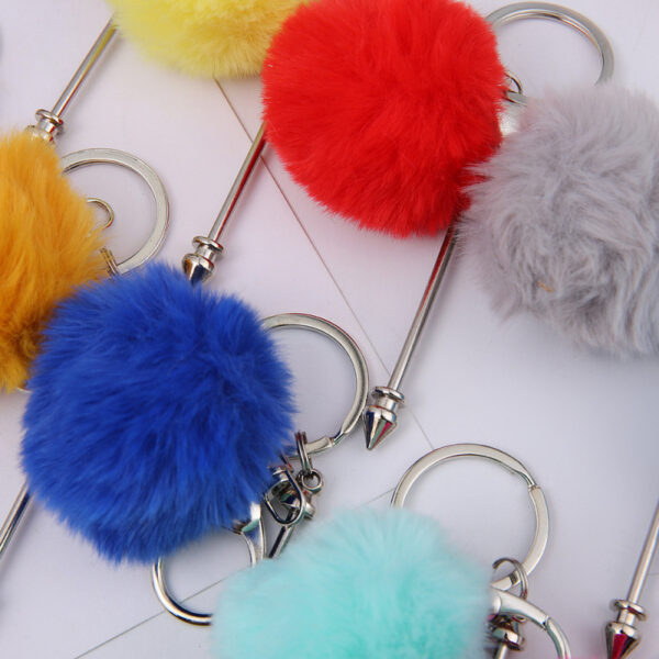 oly-bfbee37917dbb5b561e50424b423076e Wholesale DIY Fur Ball Rivet Beaded Keychain Creative Plush Pendant Luggage Jewelry Accessories Keychain Manufacturer